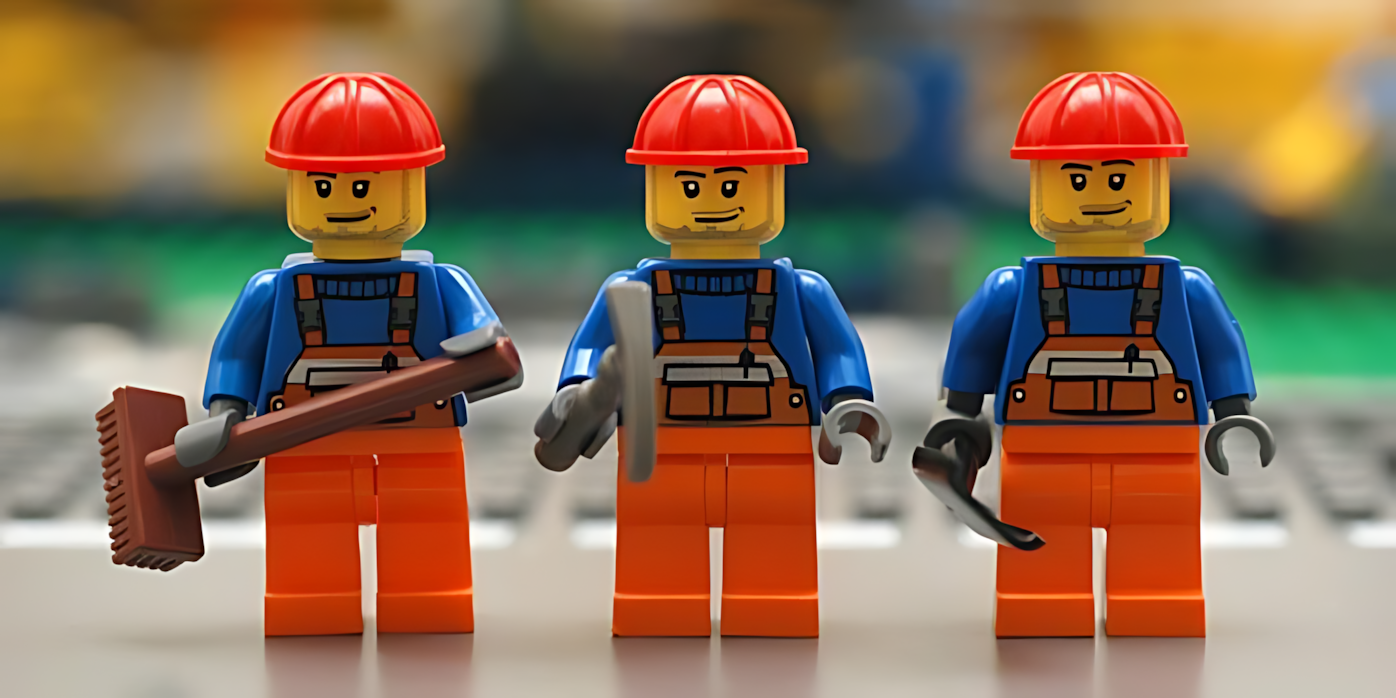 Lego construction workers standing in a row